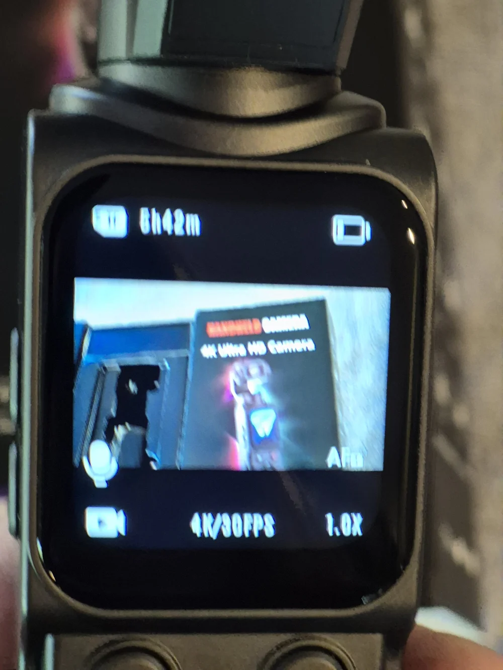 Handheld 4K Ultra HD Black Video Camera with Two-Axis Gimbal.